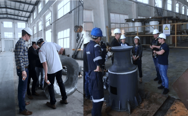 Engineering team analyzing designs on AutoCAD software